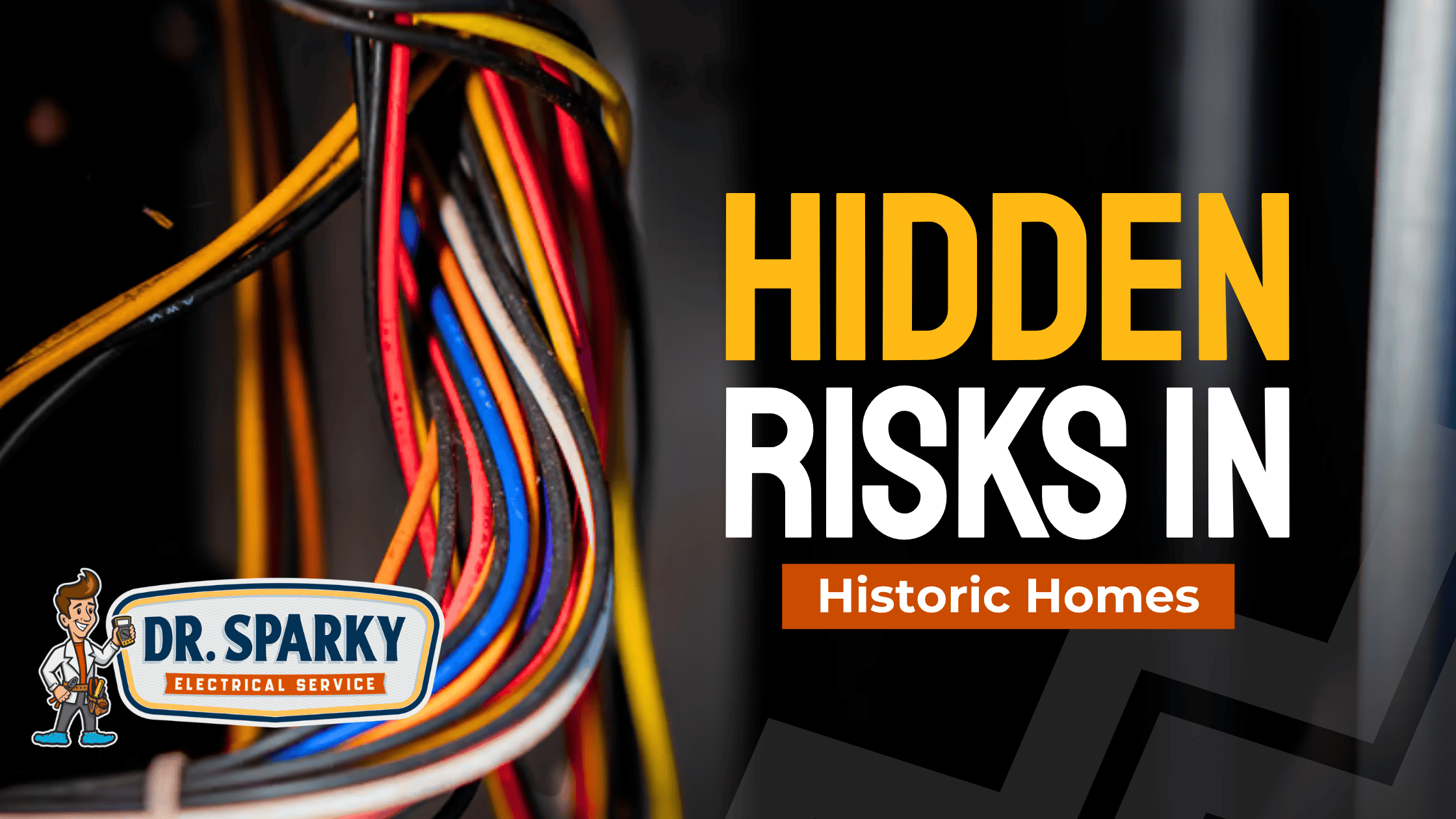 Colorful electrical wires inside a historic home electrical panel.